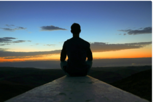 Man looking at the horizon
