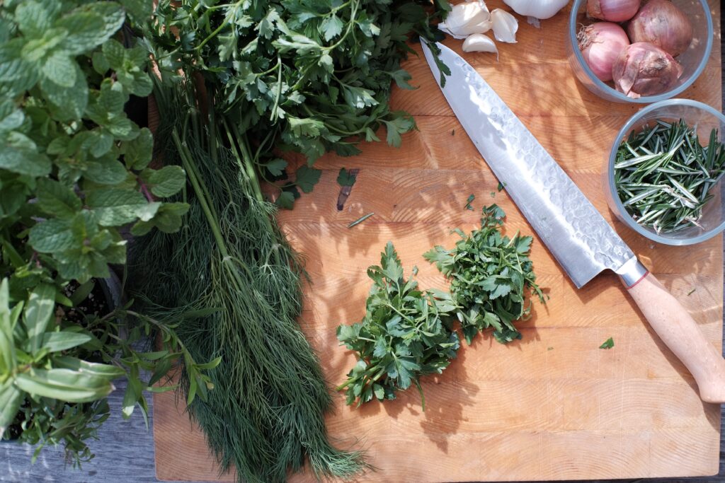 Wild herbs on a chopping board
