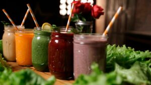 Glasses of several different types of smoothies