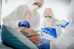 A patient being taken car of by doctors